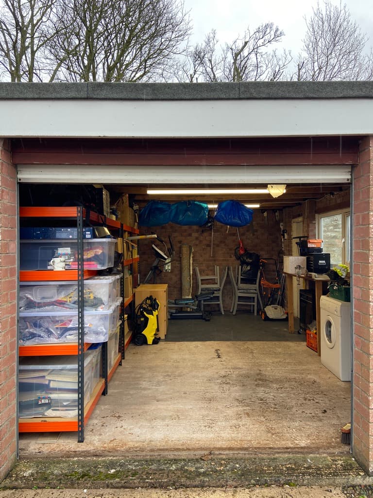 Beautifully reorganised garage with professional shelving in Cupar